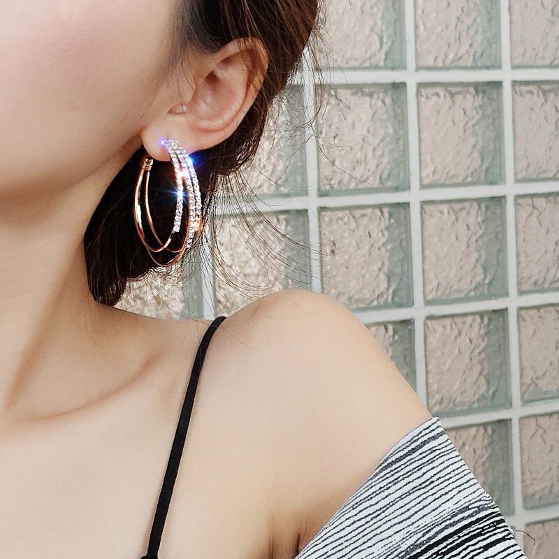 Female silver circle earrings